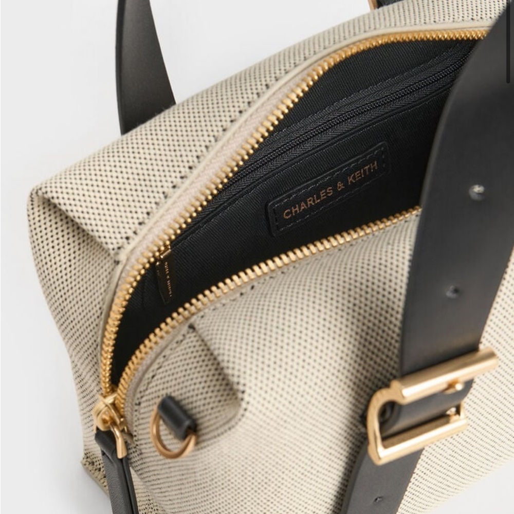 Charles & Keith Elegant Black and Cream canvas Satchel with shoulder strap - Picture 3 of 8